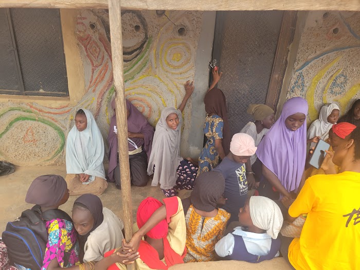 Group activity with children at IDP Outreach